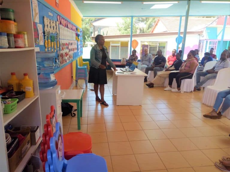 Parents and staff meeting together at the school