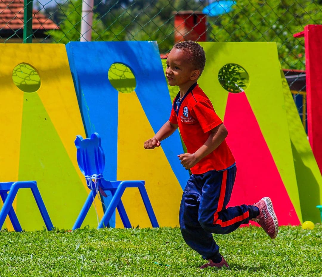 A learner sprinting in a race on sports day